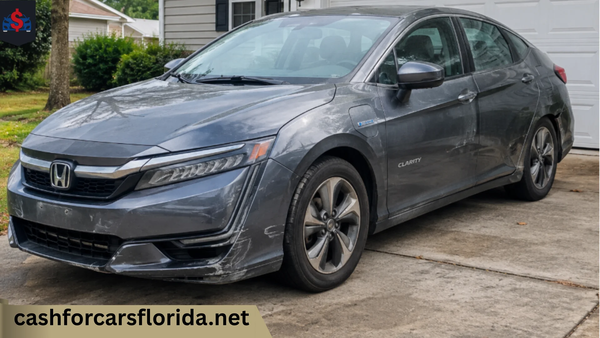Honda Clarity Plug-in Hybrid with body damage parked in a Florida driveway, ready to sell for cash with battery trouble